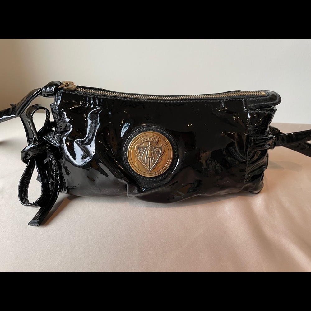 Gucci patent leather wristlet